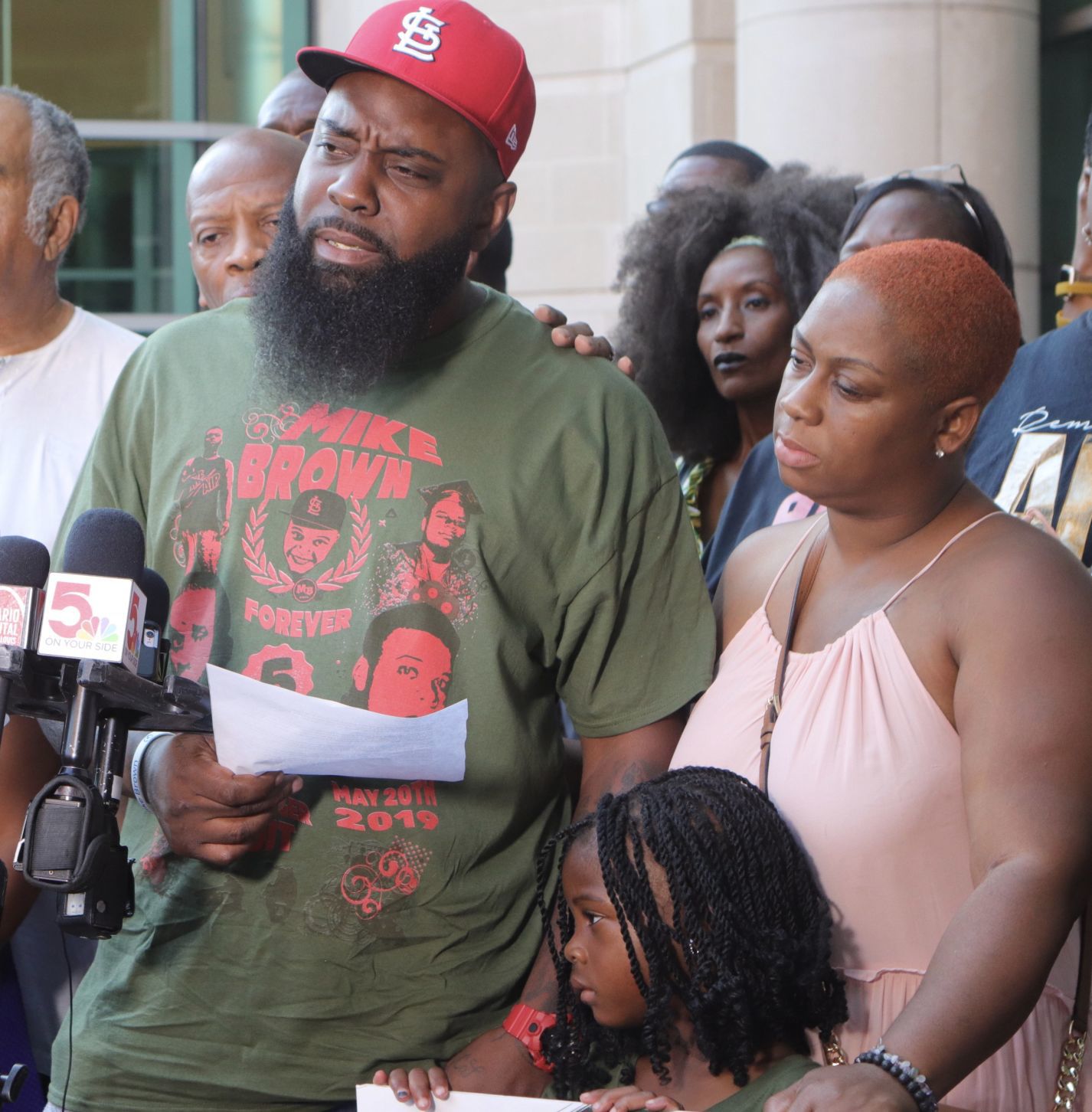 Michael Brown Sr. speaks to the press